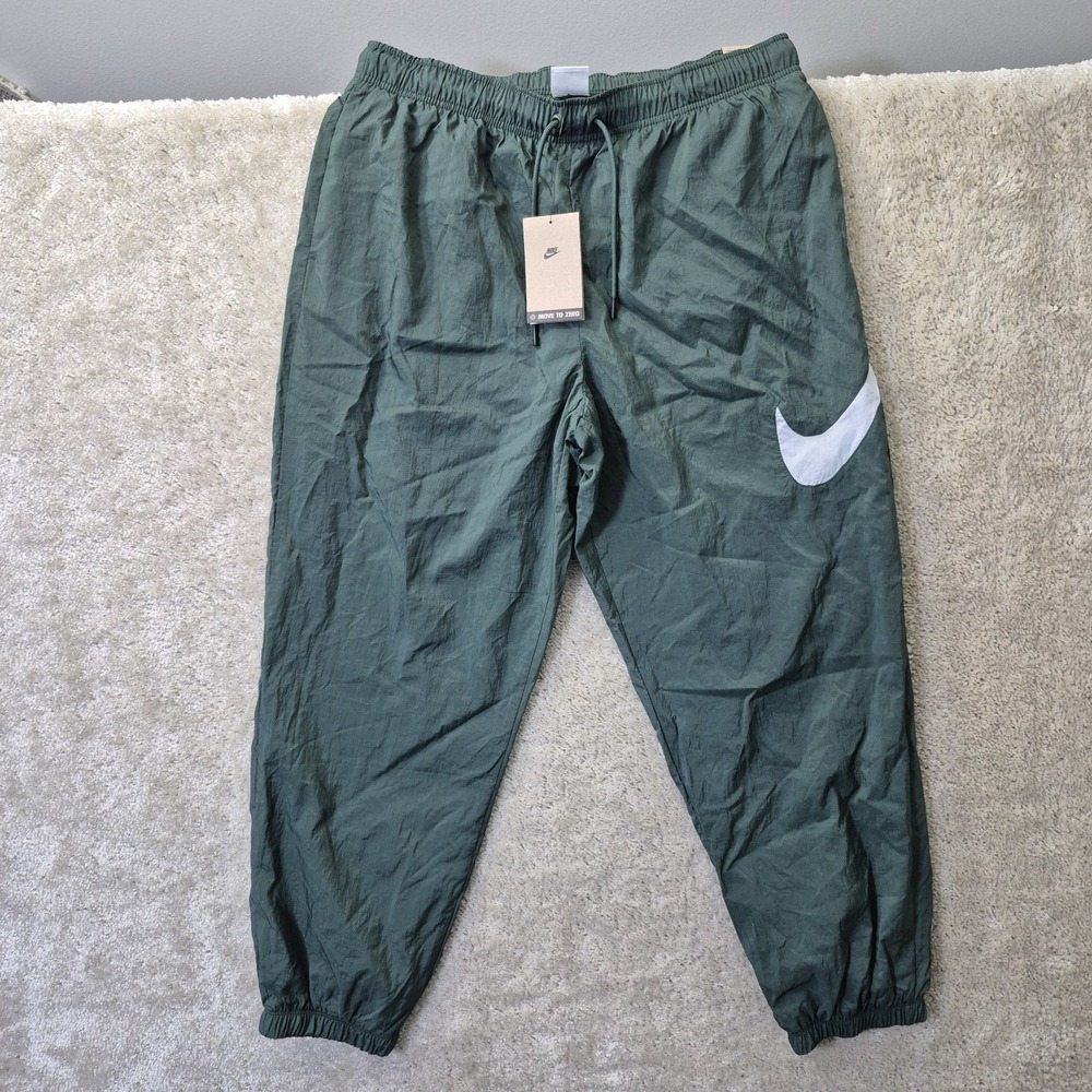 Nike Sportswear Essentials Pants Womens Large Green Windbreaker Mesh Lined Logo